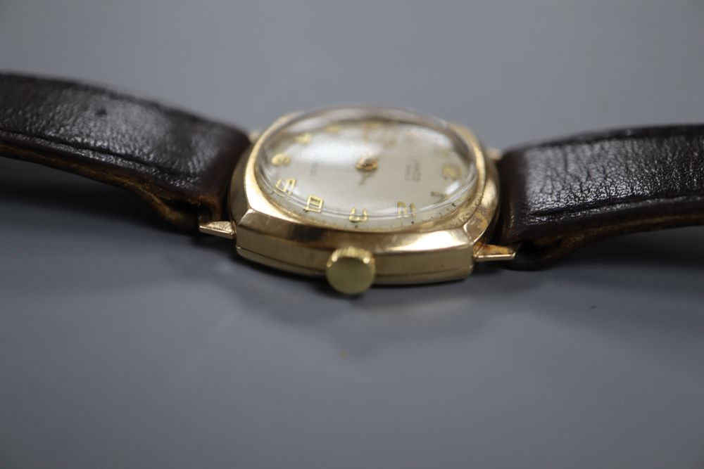 A gentlemans 1960s 9ct gold Lanco manual wind wrist watch, on leather strap.